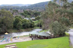 a park with a gazebo and a playground at Willows Cottage in Warburton