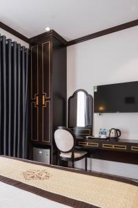 Kuchyň nebo kuchyňský kout v ubytování Navy Hotel Hà Nội