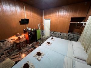 Voodi või voodid majutusasutuse Tongta Phaview Resort toas
