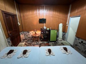 Voodi või voodid majutusasutuse Tongta Phaview Resort toas