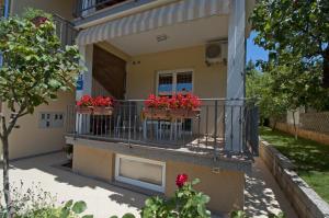 Ein Balkon oder eine Terrasse in der Unterkunft Apartments Maria