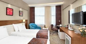 Televisyen dan/atau pusat hiburan di The Merlot Hotel Eskisehir