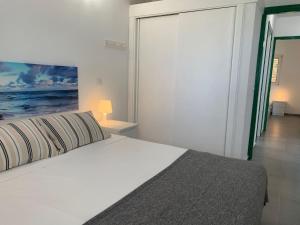 Postel nebo postele na pokoji v ubytování Sonnenland Suites + 23 fotografií