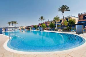 The swimming pool at or close to Meloneras Bay Suites