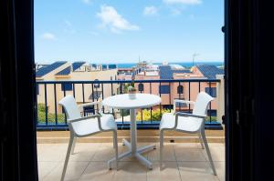 A balcony or terrace at Meloneras Bay Suites