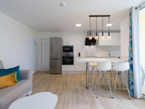 A kitchen or kitchenette at Olas Suites Playa del Ingles