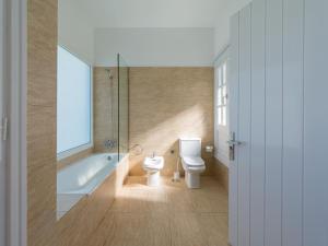 Ένα μπάνιο στο Pasito Villas