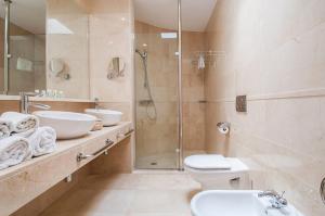 Ein Badezimmer in der Unterkunft Tauro Villas Deluxe