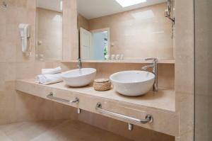 Ein Badezimmer in der Unterkunft Tauro Villas Deluxe