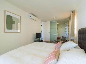 Postel nebo postele na pokoji v ubytování Oasis Villas Maspalomas