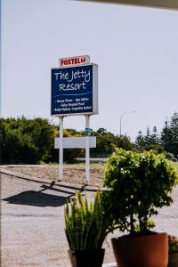 Ein Zertifikat, Auszeichnung, Logo oder anderes Dokument, das in der Unterkunft The Jetty Resort ausgestellt ist