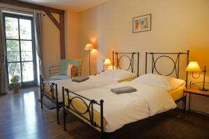 Posteľ alebo postele v izbe v ubytovaní Hotel Via Ironia