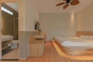 Postel nebo postele na pokoji v ubytování Tây Tiến Bungalow