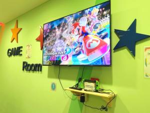 TV a/nebo společenská místnost v ubytování Walden Hotel