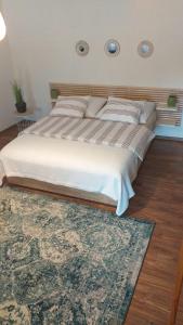 Postel nebo postele na pokoji v ubytování Apartamenty no3
