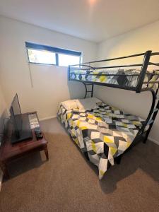 Postel nebo postele na pokoji v ubytování Naseby Modern Home