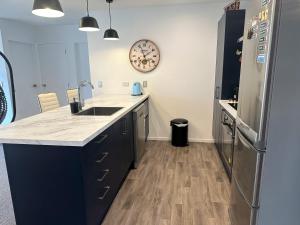 Kuchyň nebo kuchyňský kout v ubytování Naseby Modern Home