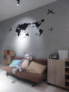 Postel nebo postele na pokoji v ubytování S99 HOMESTAY KUDAT