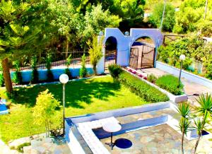 A garden outside Villa Naya by the Beach