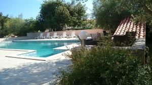 Bazén v ubytování Hotel Carmen nebo v jeho okolí