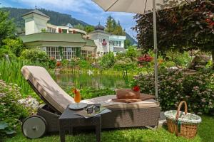 Ogród w obiekcie Salzburgerhof, das 5-Sterne Hotel von Zell am See