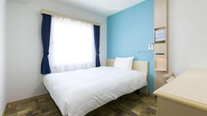 Toyoko Inn Tokyo Keio-sen Higashi-fuchu-eki Kita-guchi 객실 침대