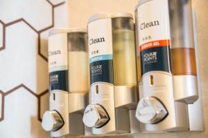 a shelf with four differentiatesiatesiatesiatesiatesiatesiatesktop at Four Points By Sheraton Guilin Lingui in Guilin