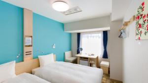 Toyoko Inn Tokyo Keio-sen Higashi-fuchu-eki Kita-guchi 객실 침대