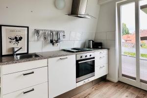 Kuchyň nebo kuchyňský kout v ubytování Der Stader Hafenblick + 6 fotografií