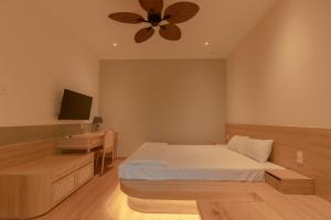 Postel nebo postele na pokoji v ubytování Tây Tiến Bungalow