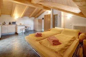 En eller flere senge i et værelse på Castagne Baitel li Pigna