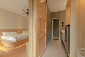 Postel nebo postele na pokoji v ubytování Tây Tiến Bungalow