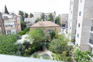 an aerial view of a building in a city at Cosy and Suits apartment in Jerusalem