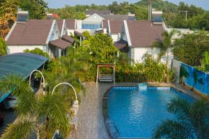 an image of a swimming pool at a resort at Tây Tiến Bungalow in Phú Quốc