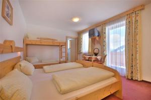 Postel nebo postele na pokoji v ubytování Panoramahotel Burgeck