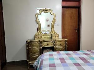 Postel nebo postele na pokoji v ubytování Cozy Apartment