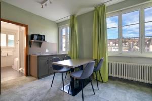Köök või kööginurk majutusasutuses flexymotel Schönenwerd