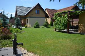 Vonkajšia záhrada v ubytovaní Apartmány Best I. Bešeňová