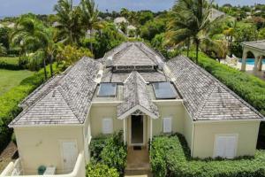 een luchtzicht op een huis met een dak bij Palm Ridge 2A Heaven Scent, Royal Westmoreland by Barbados Sothebys International Realty in Saint James