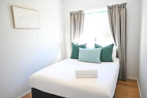 Postel nebo postele na pokoji v ubytování Glen Villa Resort
