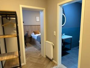 Ein Bett oder Betten in einem Zimmer der Unterkunft Aparthotel Lenau