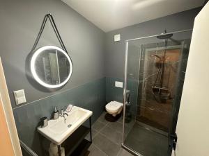 Ein Badezimmer in der Unterkunft Aparthotel Lenau