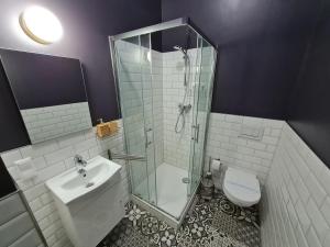 Ein Badezimmer in der Unterkunft Aparthotel Lenau