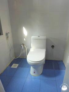 Koupelna v ubytování Bardia Homestay Pvt. Ltd.