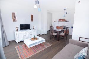 a living room with a couch and a table at B&B APARTMENTS in Ohrid