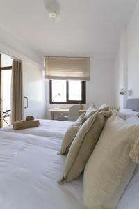 Postel nebo postele na pokoji v ubytování Apartamento Sunny Holidays + 21 fotografií