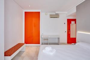 Postel nebo postele na pokoji v ubytování Hotel DL Port