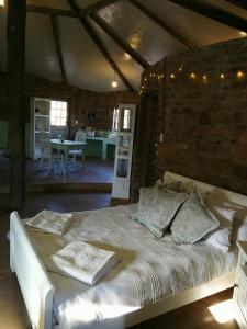 a bedroom with a large bed in a room at Rangers Reserve in Touwsrivier