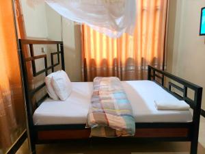Ein Bett oder Betten in einem Zimmer der Unterkunft Peacefully Resort