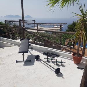 a group of dumbbells sitting on the roof of a house at casavictoria in Ponza